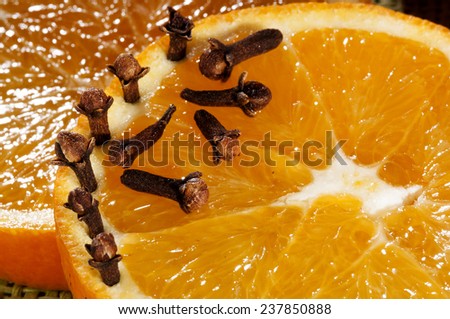 orange slices fresh-cut and cloves ready to decorate the food
