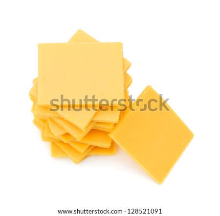 Cheddar Cheese Slices On White Background. Stock Photo 128521091 ...