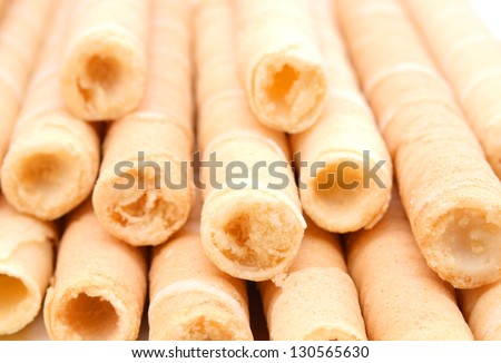 Close-up of striped wafer rolls
