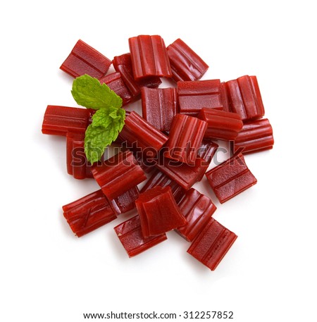 red licorice candies isolated on white background