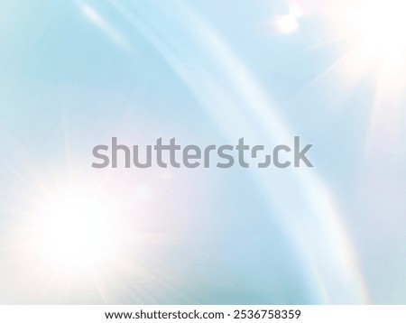 Light​ blue​ back​ground​ image​ has​ a​ white​ and​ pink​  beam​ of​ light​ shining​ through​ it​ for​ Graphics​