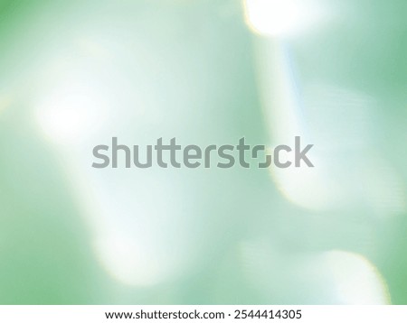 White​ bokeh​ on​ a​ green​ back​ground​ for​ Graphics​