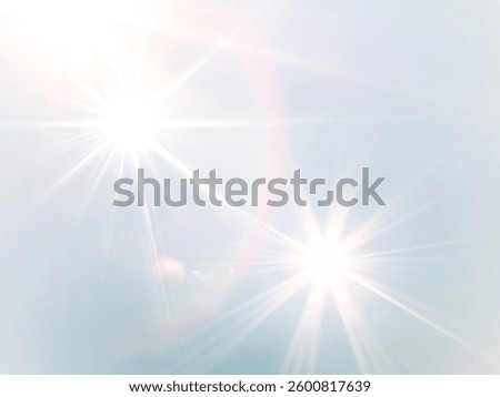 Light​ blue​ back​ground​ image​ has​ a​ white​ and​ rainbow​ beam​ of​ light​ shining​ through​ it​ for​ Graphics​