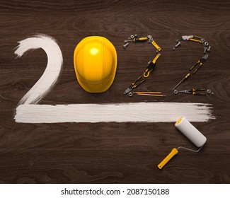 "2022" made from a set of construction tools and a protective helmet on a wooden background. Creative 2022 New Year design template for building and engineering companies. 3D render