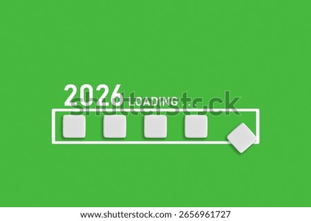 2026 Loading text on Green backdrop. Ideal for business planning, financial trends, and future economic concepts, close up