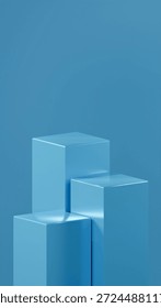 3 different sizes of cube podiums on Celestial Blue color are arranged over a Celestial Blue background. metallic shiny cubes.