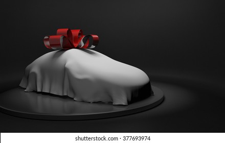 3D car wrapped under a sheet and big red bow