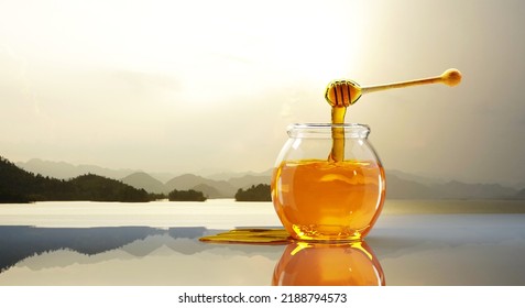 3D Honey Jar With Wooden Honey Stick Get Some Pure Sweet Honey Bee Organic Food Shiny Golden Brown Color On Glossy Table And Some Melt Fluid Blurred Soft Light Color Natural View Background