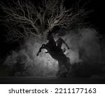 3d illustration of a Headless Horseman figure in fog with a sinister dead tree behind it