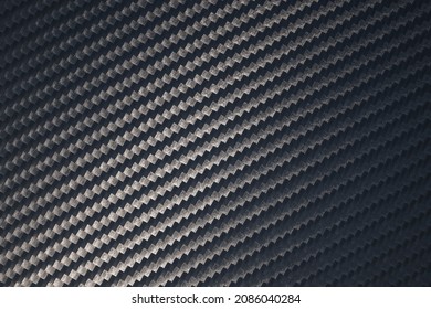 3D Illustration. Macro Of Woven Carbon Fibre Sheet Surface. Diagonal Orientation Of Texture And Pattern. Modern Technology And Material Concept.

