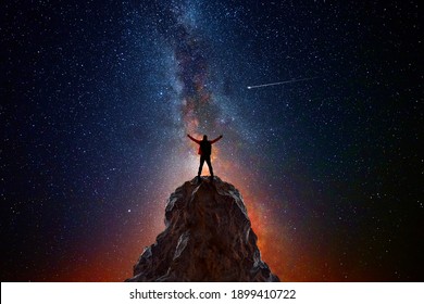 3D. Illustration. Man on top of a mountain observing the universe