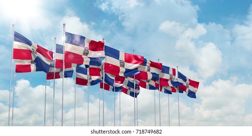 3d Illustration of many flags of Dominican Republic in rows waving in the wind against blue sky