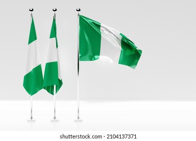3D illustration of the national flag of Nigeria on a metal flagpole fluttering .Country symbol.