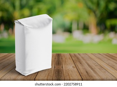 3D Illustration. Paper Bag Packaging Mockup Isolated On Wooden Background.