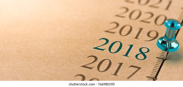 3D Illustration Of A Timeline On Kraft Paper With Focus On Year 2018 And A Blue Thumbtack.