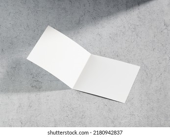 3D Illustration. White Square Bifold Flyer Isolated On Marble Background.