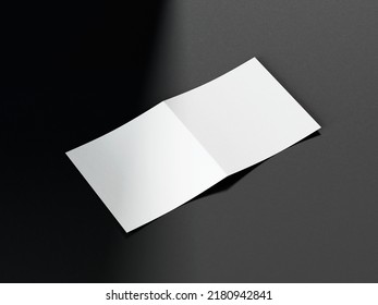3D Illustration. White Square Bifold Flyer Isolated On Black Background.