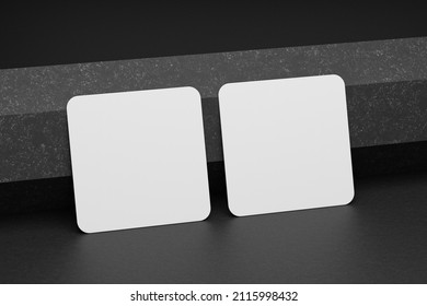 3d Mockup Of A Square Business Card With Rounded Corners On A Black Paper Background