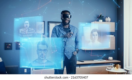 3d render African American man wearing VR goggles at online business meeting in meta universe cyberspace talking with colleagues over video conference, holographic windows in front of him