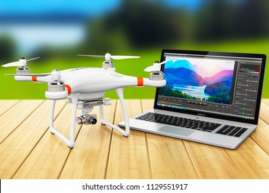 3D Render Illustration Of The Black Professional Quadcopter Drone And Laptop Of Notebook Computer PC With Video And Footage Editing Software On Screen Display On The Wooden Table Outdoors