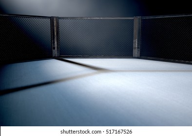 A 3D render of an MMA fight cage arena dressed in black padding spotlit by a single light on an isolated dark background