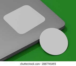 3d Render Of A Mockup Of A Square Sticker On A Laptop Plus Round Business Card On A Green Chromakey Background For Easy Background Color Change