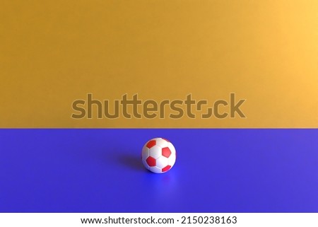 3d render of a red and white ball on a blue and yellow background. Worl cup resources