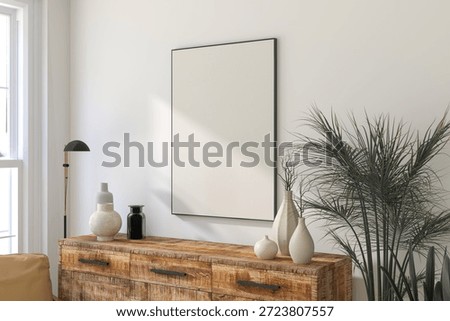 3D render of a vertical thin black frame hanging on a light wall in a modern interior