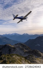 3d Rendering airplane. Background from BC, Canada. A sleek light aircraft soars above rugged alpine peaks under a blue sky.