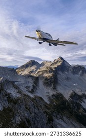3d Rendering airplane. Background from BC, Canada. A sleek light aircraft soars above rugged alpine peaks under a blue sky.