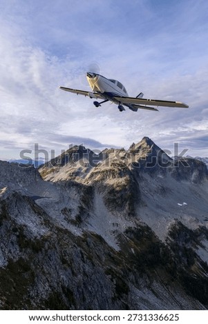 3d Rendering airplane. Background from BC, Canada. A sleek light aircraft soars above rugged alpine peaks under a blue sky.