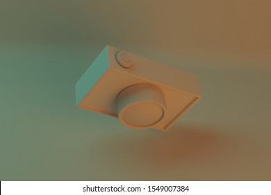 3D Rendering of Basic Photo Camera with Teal adn Orage Ilumination