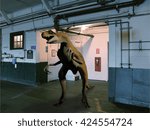 3d rendering of a dinosaur emerging from a restroom
