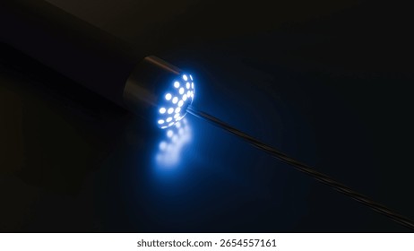A 3d rendering of the distal end of a laser atherectomy device. A medical instrument for minimally invasive intravascular procedures, utilizing laser technology to precisely remove blockages.