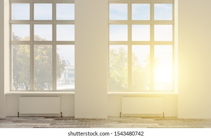 3D rendering, empty office space. open space. walls in bright colors. large panoramic windows.. Sunset
