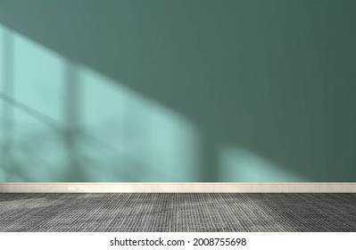 3D Rendering Of Empty Room With Neatly Finishing Teal Green Wall With Wooden Baseboard And Grey Carpet. Morning Sunlight Show Beautiful Leaves Shadow On The Wall, Home, Products, Mockup, Background.