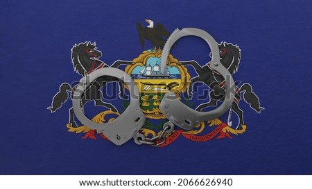 3D rendering of a half opened steel handcuff in center on top of the US state flag of Pennsylvania