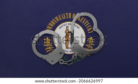 3D rendering of a half opened steel handcuff in center on top of the US state flag of Kentucky
