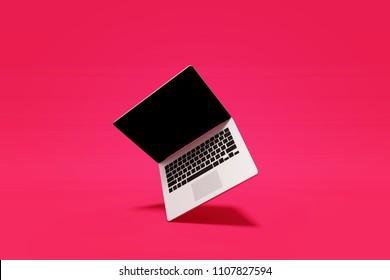 3D Rendering : Illustration of laptop notebook mock up with color background. float or levitate laptop. technology gadget for hipster background concept. high resolution