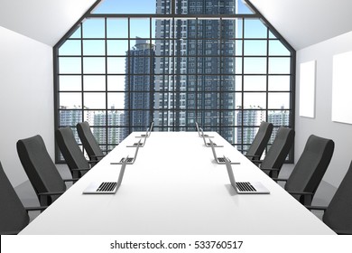 3D Rendering : illustration of Modern conference room with office chair furniture.big windows and city view.office mock up.laptops on white table
