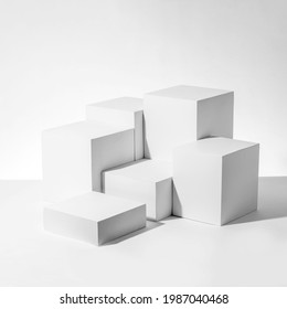 A 3D rendering illustration of white cubes one on another