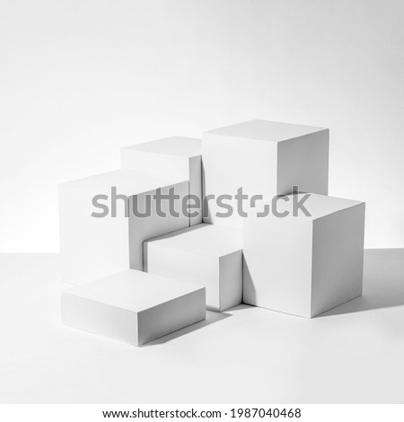 A 3D rendering illustration of white cubes one on another