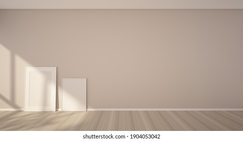 3d rendering of interior. Beige wall, light wood floor with blank picture frames placed on the floor and sunlight shining in the room.