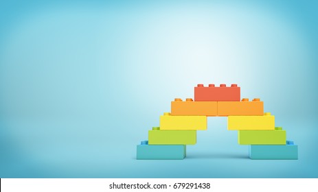 3d rendering of multi-colored toy blocks making up a rainbow bridge. Building sets. Children toys. Leisure and recreation.