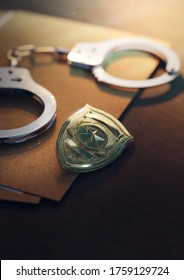 3D Rendering Of A Police Badge With Handcuffs On A Dark Background