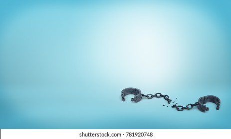 3d rendering of set of iron black handcuffs on a broken chain lying open on a blue background. Free of restrictions. Leave business limitations behind. Get free from credit burden.