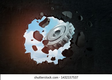 3d Rendering Of Silver Gear Wheel Breaking Black Wall. Objects And Materials. Demolition And Destruction. Digital Art.