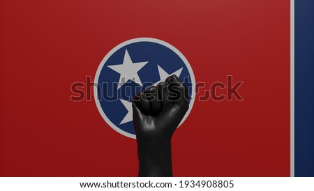 3D rendering of a single raised Black Fist in the center in front of the Flag of Tennessee