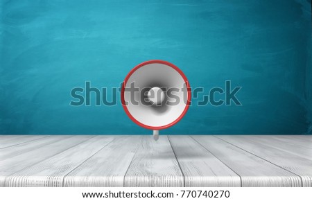 3d rendering of a single red and white megaphone hanging vertically above a wooden desk. Public speaker. Attention. Emergency and disaster information.