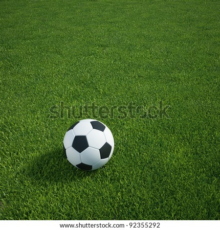 3d rendering of a soccerball lying on grass